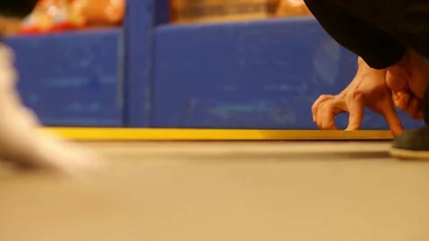 Workers measuring with a ruler drywall panel and then cut him with a knife  Stock Footage 78219442