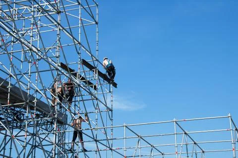 Workers on a metal structure. On high. Stock Photos