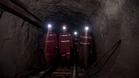 Workers in mine perforating the rock using a pneumatic drill 스톡 동영상 97161670