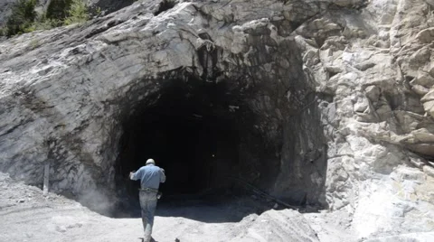 Workers/ Miners walking into Mine Stock Footage 41640234