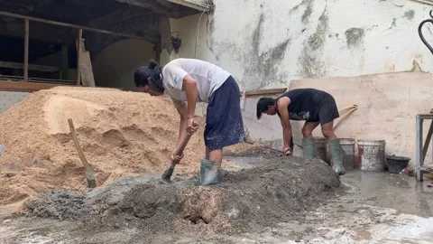 Workers mixing concrete Stock Footage 308915126