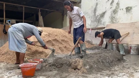 Workers mixing concrete Stock Footage 308915165