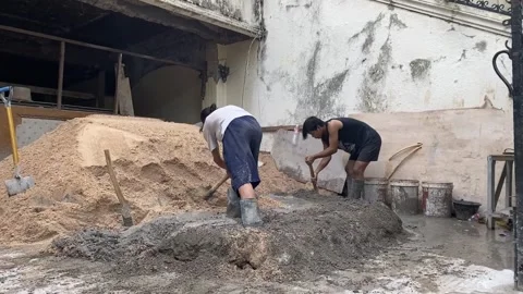 Workers mixing concrete Stock Footage 308917818