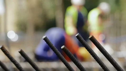 Workers on a modern construction site making steel reinforcement Stock-Footage 89915561