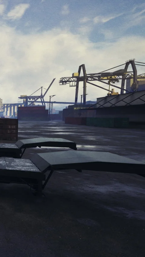Workers move cargo containers while cranes lift materials at a large port Stock Footage 331641732