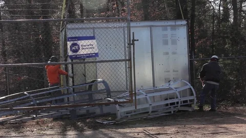 Workers Moving and Loading Metal Industrial HVAC Equipment with crane Video stock 94912774