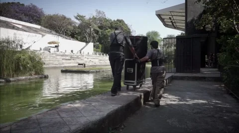 Workers moving equipment Stock Footage 48428008