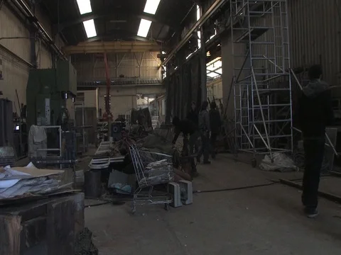 Workers moving material in factory Stock Footage 71244868