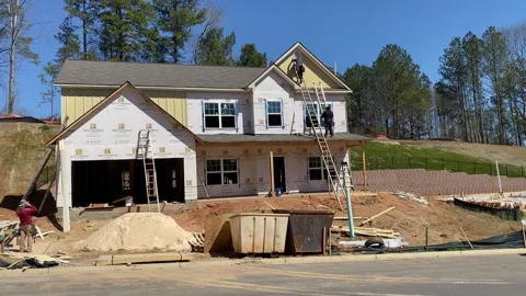 Workers in a New House Construction 2 (Thursday, March 4, 2021. Dacula GA) Stock Footage 257516806