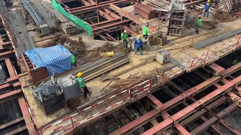 Workers occupied on construction site in Asia. Video stock 207659080
