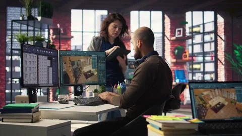 Workers in office use CAD software to design a house interior Video stock 308605585