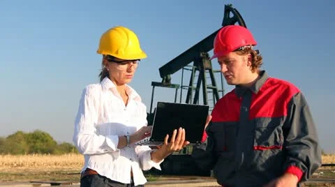 Workers in an Oilfield, teamwork Stock Footage 12212593