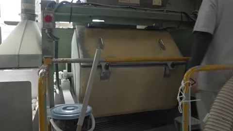 Workers Operating Fabric Covering Machine at Softball Factory Vídeo Stock 339736760
