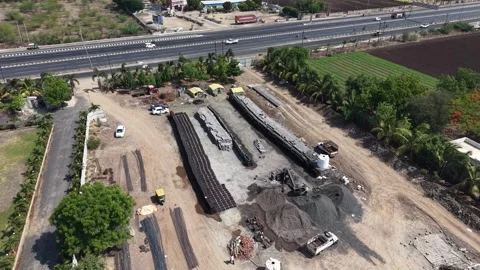 Workers Operating Heavy Concrete Loading Machinery at Industrial Construction Stock Footage 344477444