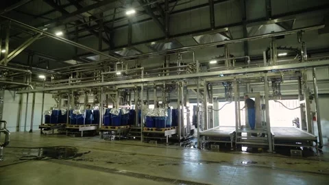 Workers operating large industrial processing line in factory Stock-Footage 347964650
