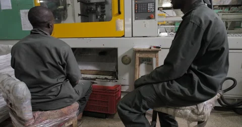 Workers Operating Machines And Checking The Quality (4K) Stock Footage 60941541