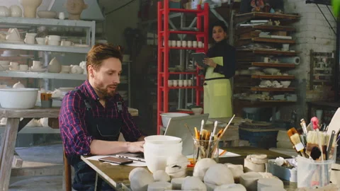 Workers Organize Storage In Pottery Studio Stock Footage 169255095