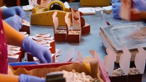 Workers Pack Confectionery Stock Footage 76335413