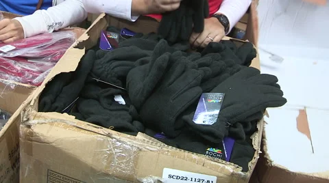 Workers packaging aid and supplies for homeless people living on the streets Stock Footage 46003455
