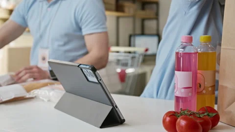 Workers Packing Online Grocery Orders Using Digital Tablet Stock Footage 346061247