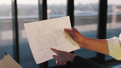 Workers Partners Holding Drawing Plan at Modern Unfinished Business Center. Male Stock Footage 234081798