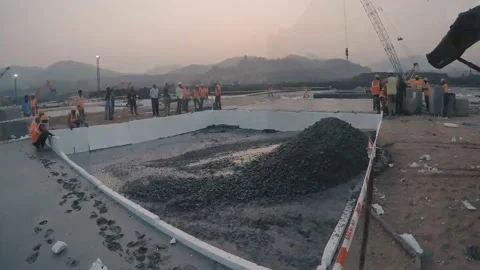 Workers perform concrete work at a construction site (time-lapse) Video stock 110850283