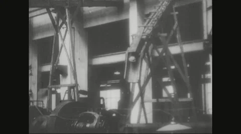 Workers placing the missiles together in ammunition factory Stock Footage 43312354