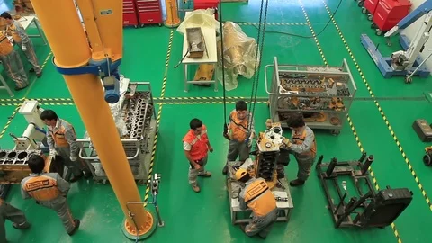 Workers on plant floor Stock Footage 77045102