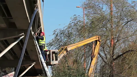 Workers Positioning New Optical Cable Stock Footage 47058849