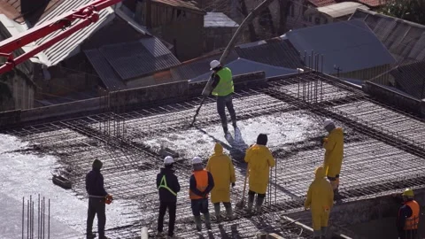 Workers pour concrete on the construction site Stock Footage 169170019