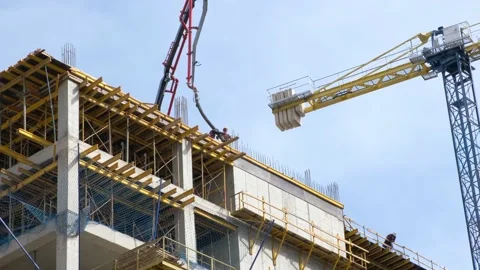 Workers pour concrete at the construction site. Stock Footage 234507760