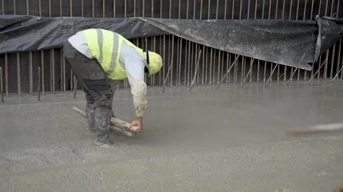 Workers pouring concrete Stock Footage 152421332