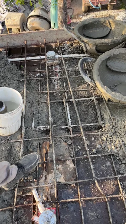 Workers Pouring Concrete onto Steel Framework Stock Footage 321010503