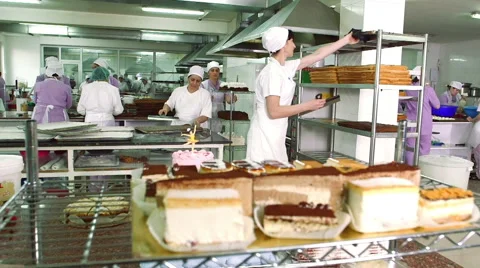 Workers preparing cakes Stock Footage 61715311