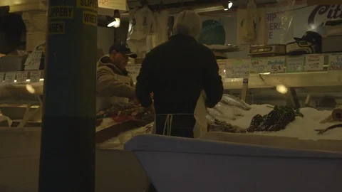 Workers Preparing Fish Display in American Market Stock Footage 115500627