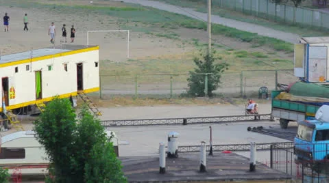 Workers preparing to install metallic pillar for circus pavilion Stockbeeldmateriaal 24728525