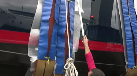 Workers preparing maxi yacht for launch Stock Footage 46002181