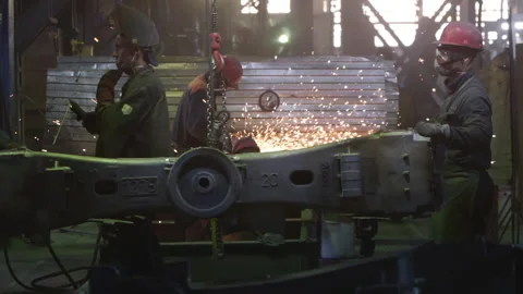 Workers Processing A Steel Structure With Grinder At Train Manufacturing Plant Video stock 161401456