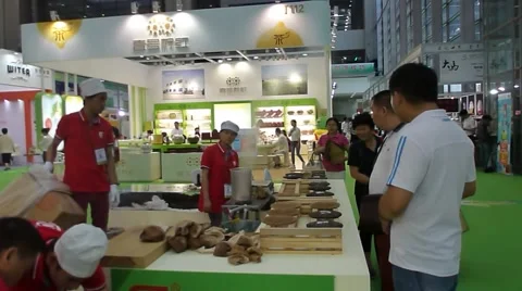 Workers processing tea drinks in the exhibition scene Stock Footage 64706589