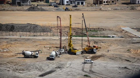 Workers produce soil drilling for the construction Stock Footage 64078137