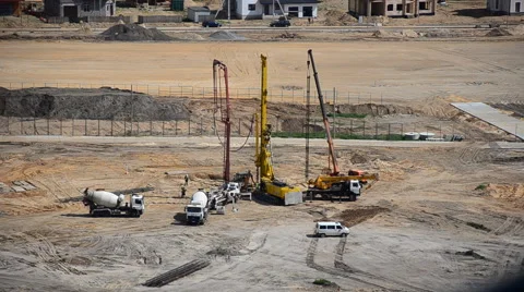 Workers produce soil drilling for the construction Stock Footage 64078497