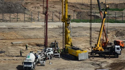 Workers produce soil drilling for the construction Stock Footage 64078798