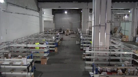 Workers at production line in big warehouse Stock Footage 56162017