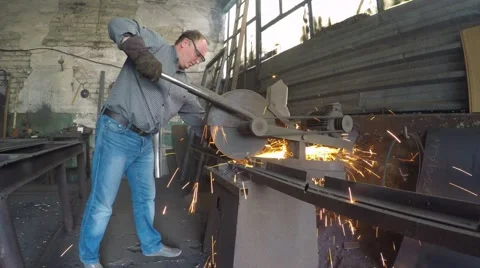 Workers in protective glasses working on a machine tool. Stock-Footage 55444605