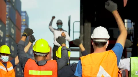 Workers protest in Cargo freight ship for import export logistic During coron Stock Footage 139096031