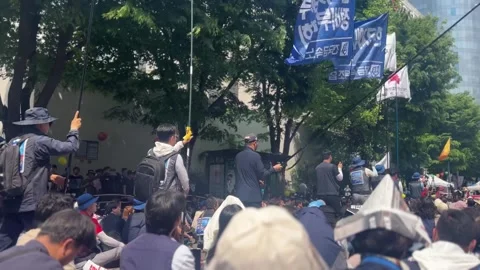 Workers protesting for workers' rights and interests, Labor Day, May 1, 2024 Stock Footage 274442534