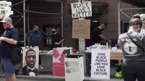Workers providing bottled water and snacks Black Lives Matter rally protest NYC Stockbeeldmateriaal 132090774