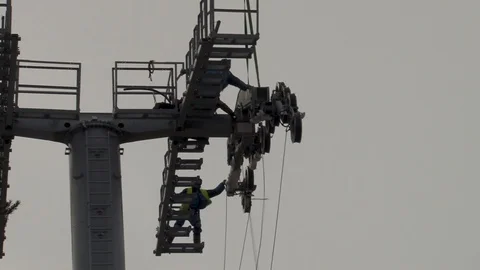 Workers pulled multi-ton structure to platform on support. Bottom view. Stock Footage 106370146