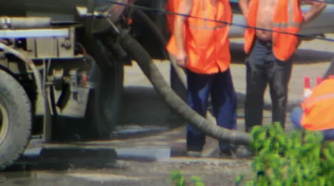 Workers pump out sewage Stock Footage 45624660