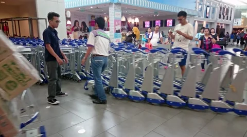 Workers Pushing Trolleys At KLIA2 스톡 동영상 53455947